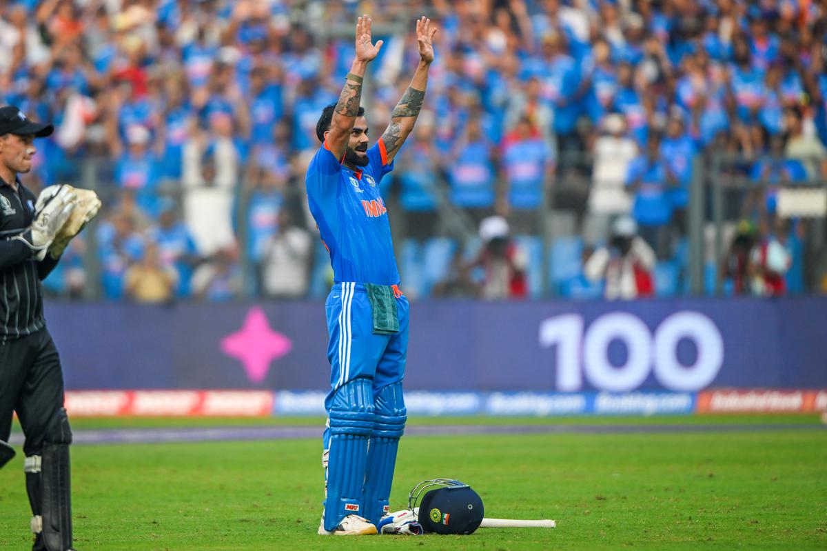 Virat Kohli celebrates after scoring his 50th century during ICC Cricket World Cup 2023 semifinal 1 between India and New Zealand. 