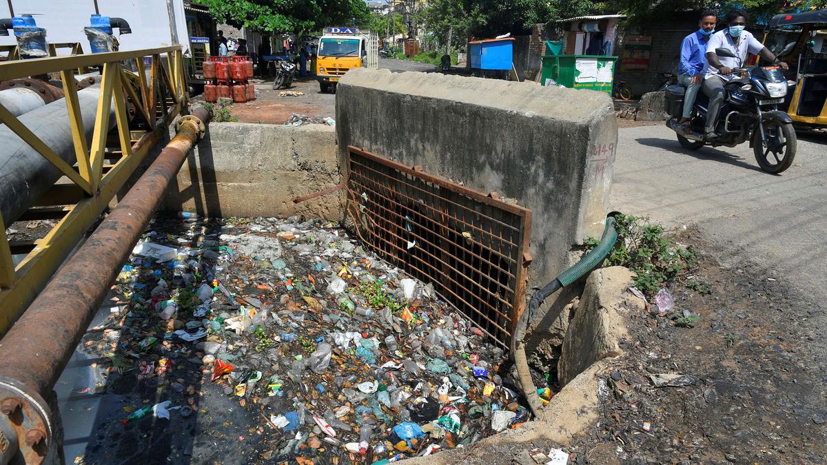 Choked stormwater drain troubles residents of Boomianpet The Hindu
