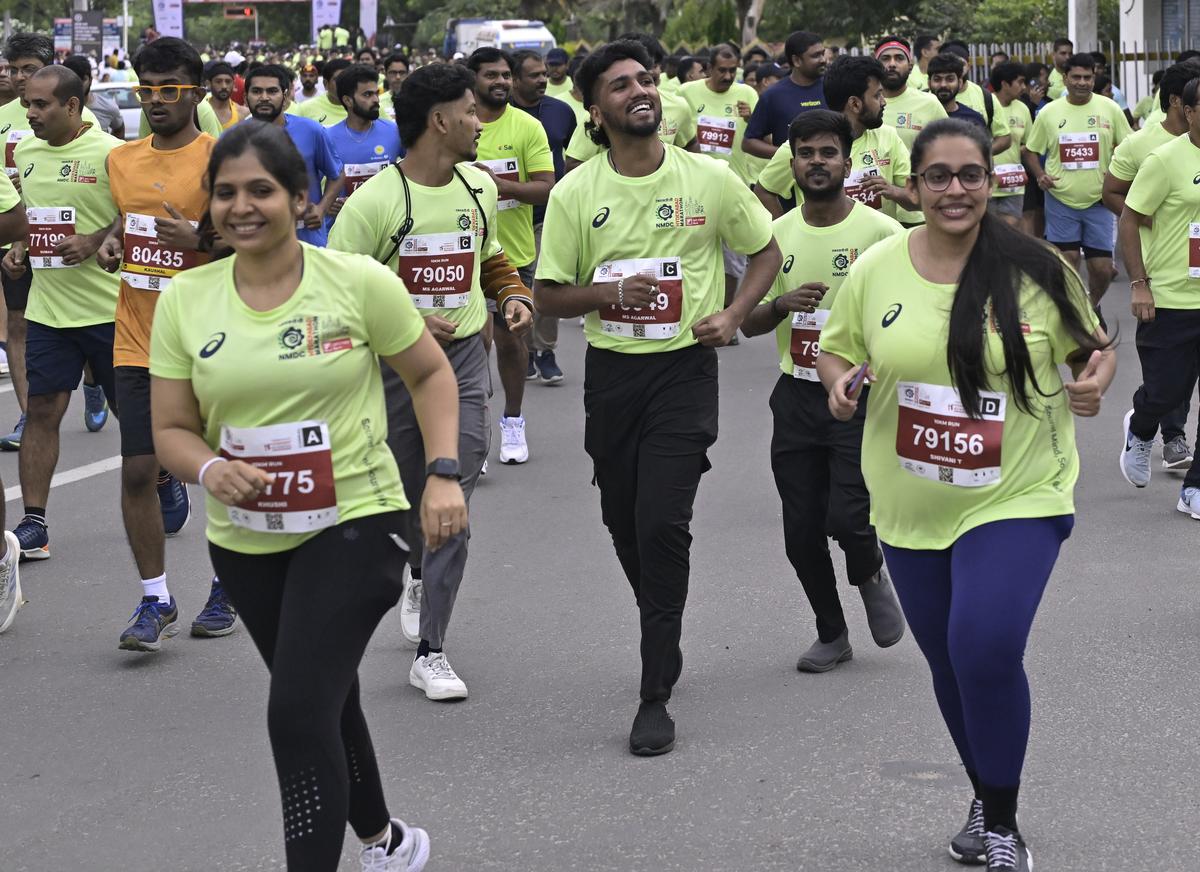 Runners in action during the 14th edition of the NMDC Hyderabad Marathon in Hyderabad on Saturday.