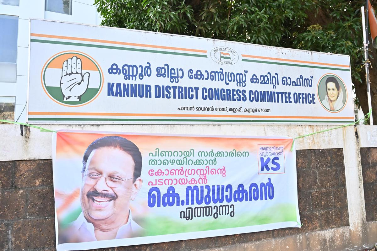 Supporters of Congress leader K Sudhakaran’s big flex near District Congress Committee  office in Kannur on March 17, 2026.