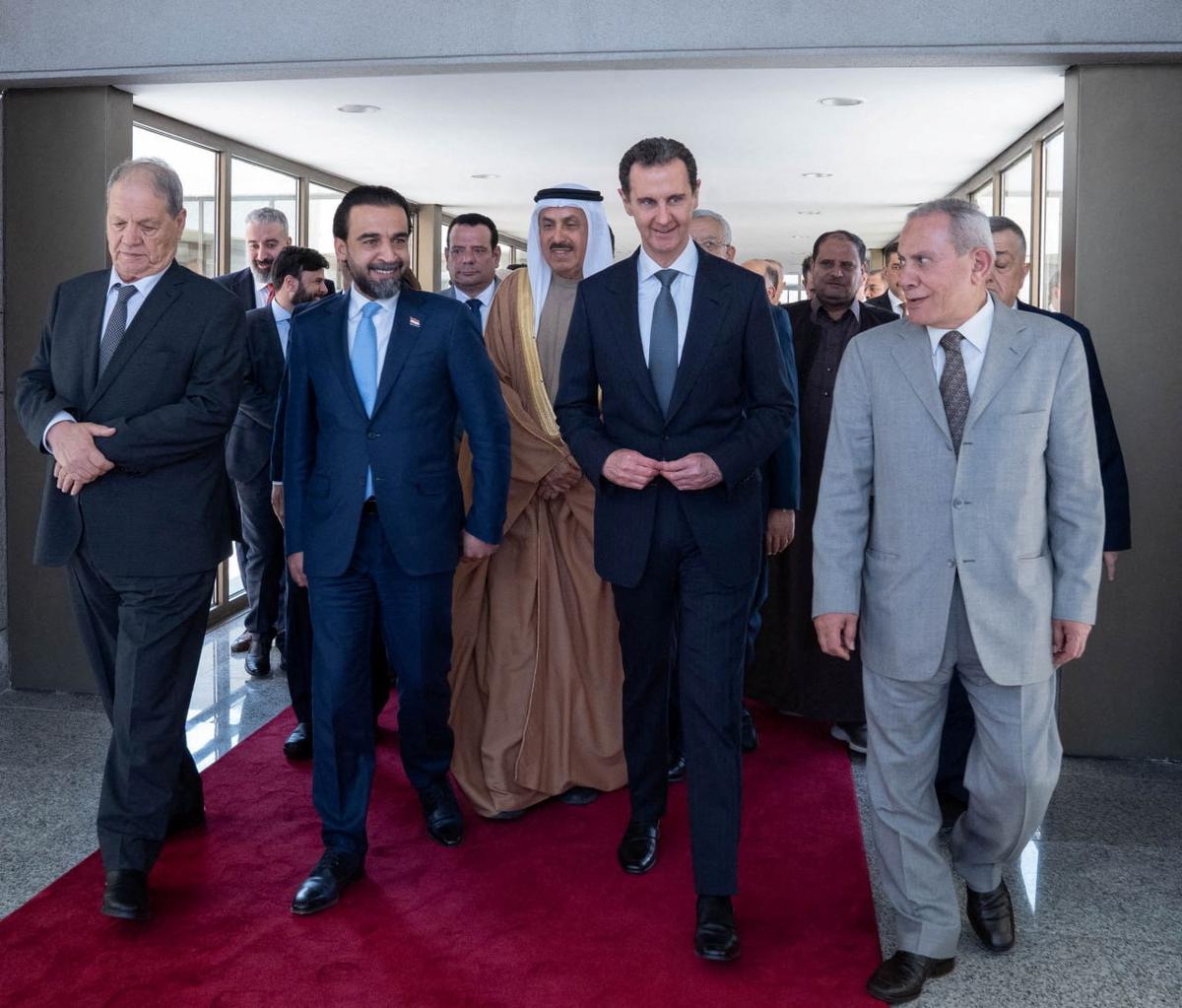Syria’s President Bashar al-Assad welcomes a delegation from the Arab Inter-Parliamentary Union in Damascus, Syria on February 26, 2023