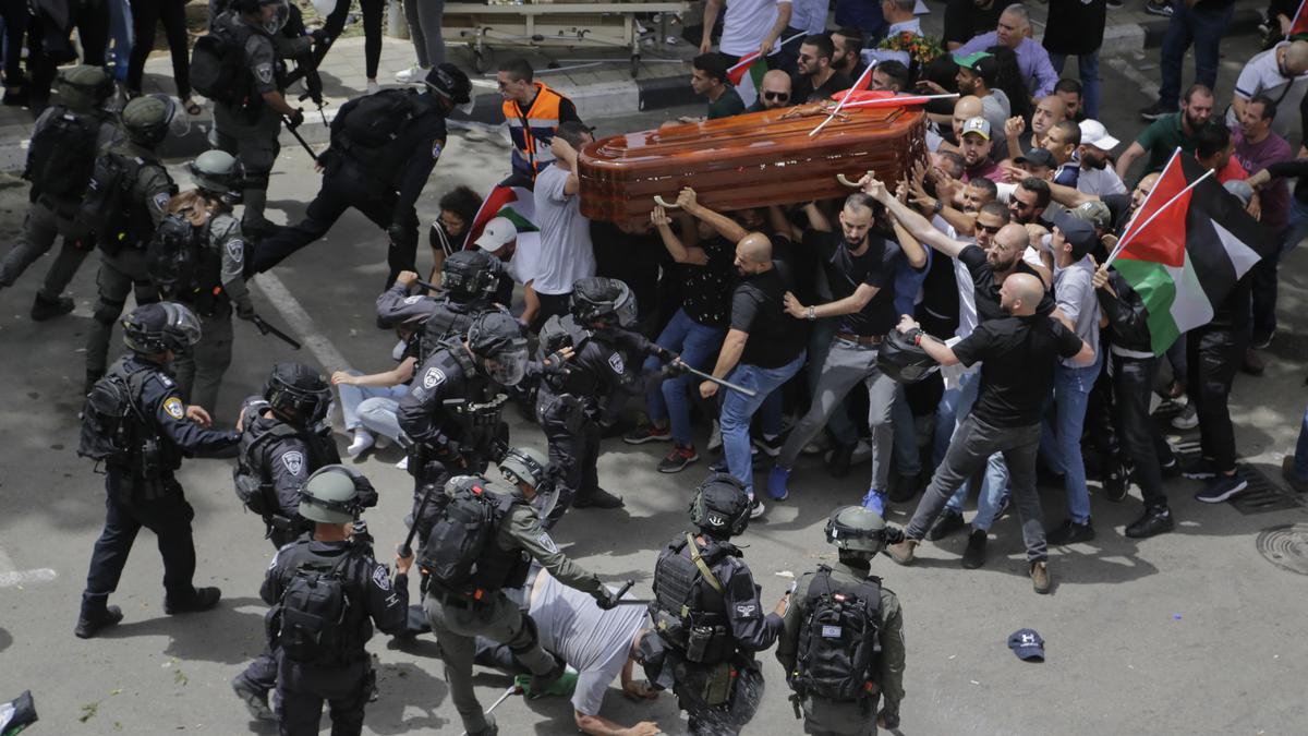 Police clash with mourners at Palestinian journalist’s funeral