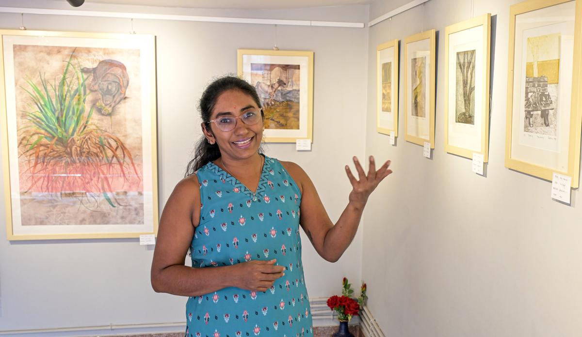 Artist Jyotsna Mandapaka explaining about her etching works at Dys Art Gallery in Visakhapatnam.  