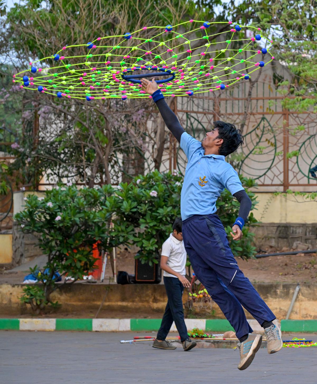 People practicing the traditional martial arts of Gatka, which has its roots in Punjab, at a training centre VMRDA Central Park, Visakhapatnam. 