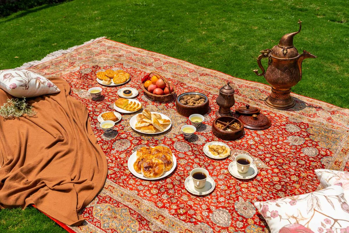 A traditional Kashmiri meal being served 