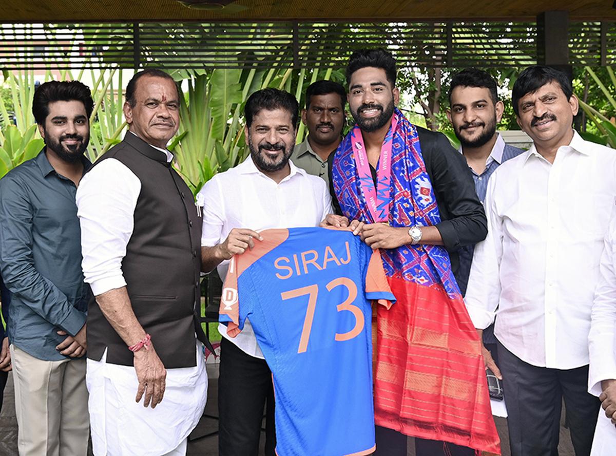 India’s pacer Mohammed Siraj with Telangana Chief Minister A. Revanth Reddy. File