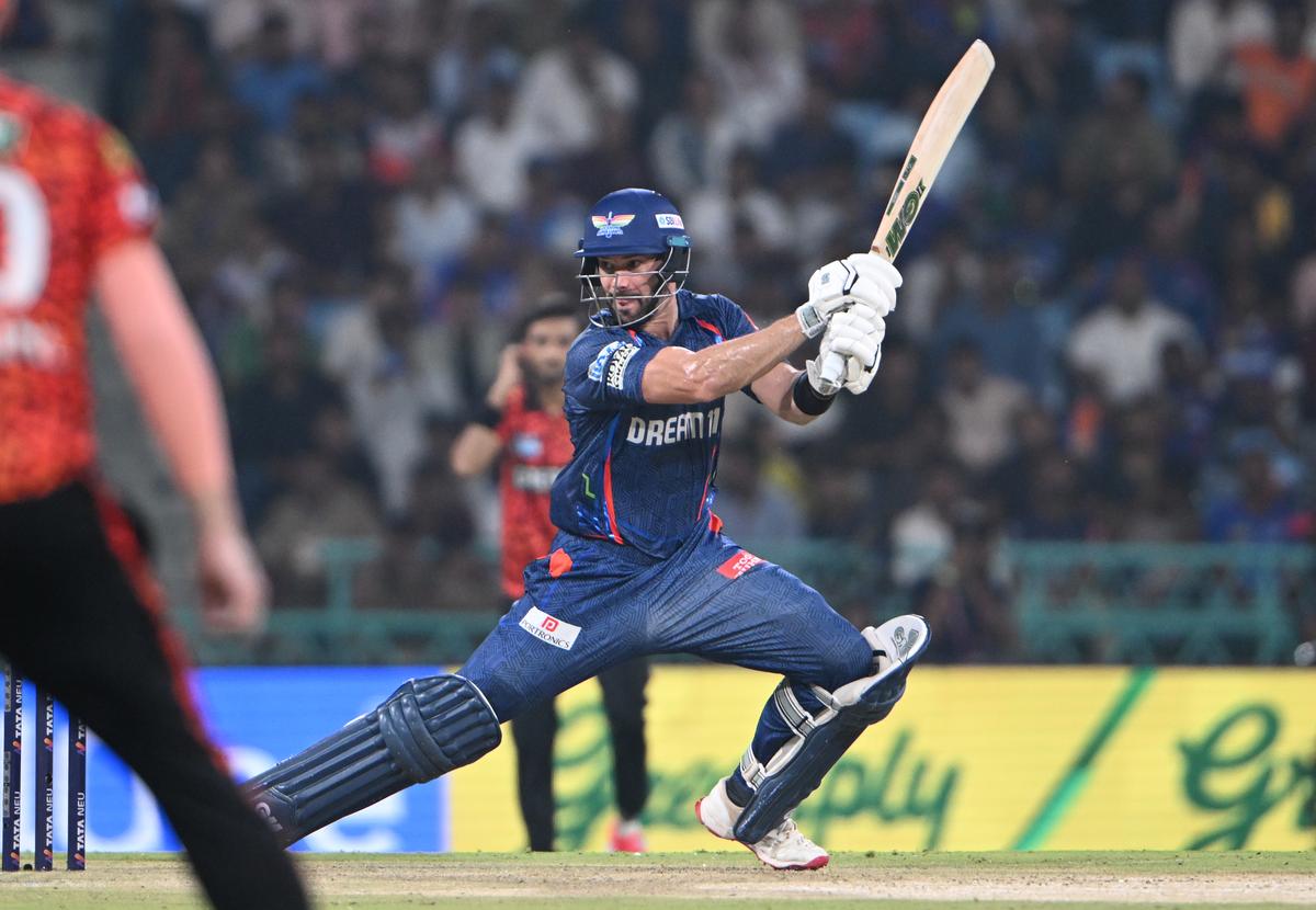 Lucknow Super Giants’ Aiden Markram drives Harsh Dubey of Sunrisers Hyderabad during IPL match at Ekana stadium, in Lucknow on May 19, 2025