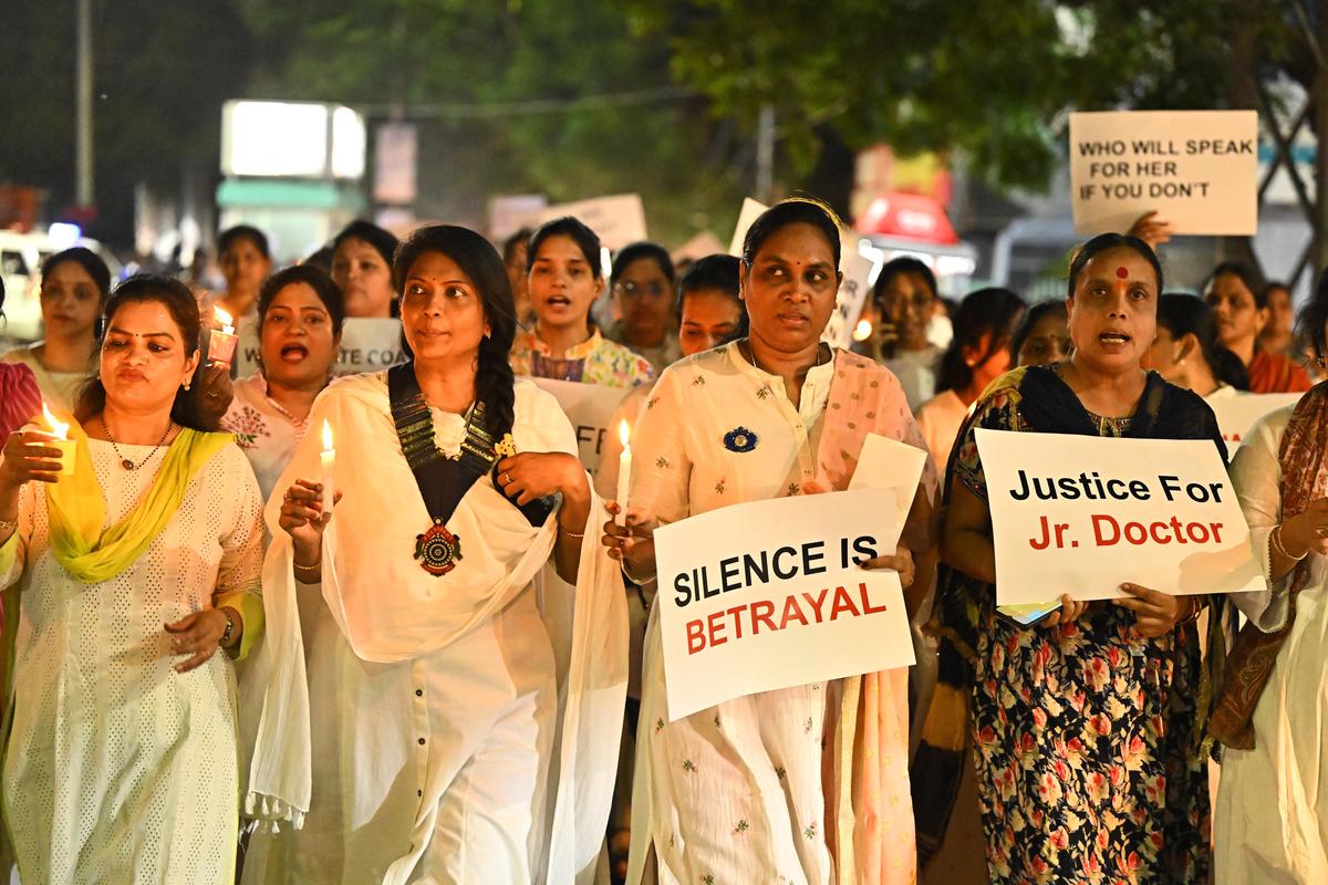 Women in Vijayawada take out a candlelight rally protesting the rape and murder of a doctor in a Kolkata hospital.