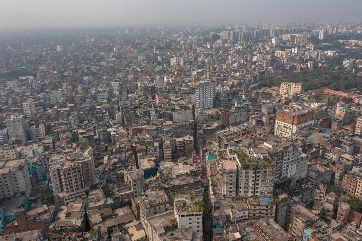 A general aerial view of an old city where roofs and walls collapsed after an earthquake in Dhaka, Bangladesh, Friday, Nov. 21, 2025. 