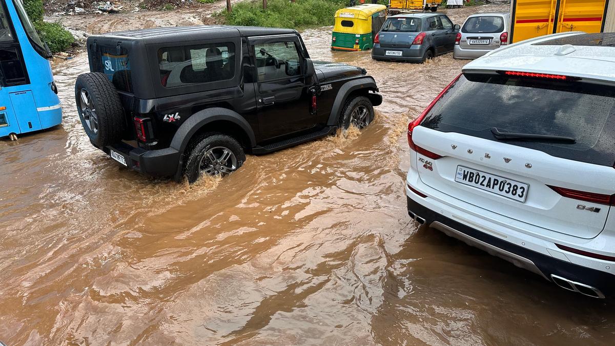 Commuters get stuck for hours in Bengaluru’s Hebbal as 45-minute rain brings traffic to a standstill