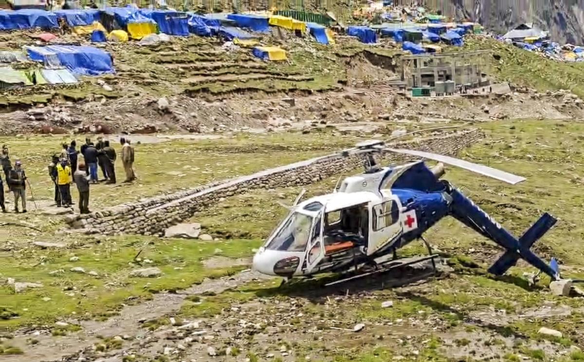 A damaged heli-ambulance from AIIMS Rishikesh crashed while landing at Kedarnath, in Rudraprayag district, Uttarakhand on May 17. A damaged heli-ambulance from AIIMS Rishikesh crashed while landing at Kedarnath, in Rudraprayag district, Uttarakhand on May 17.