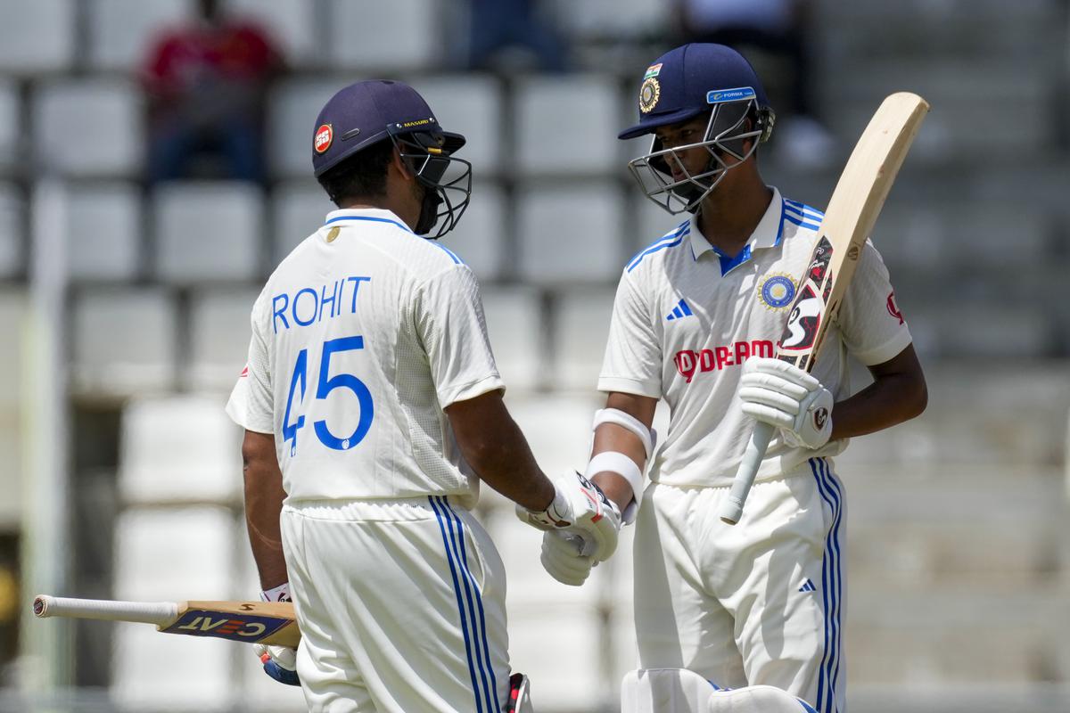 India’s captain Rohit Sharma congratulates Yashasvi Jaiswal for scoring half a century against West Indies on day two of their first cricket Test match at Windsor Park in Roseau, Dominica, Thursday, July 13, 2023. 