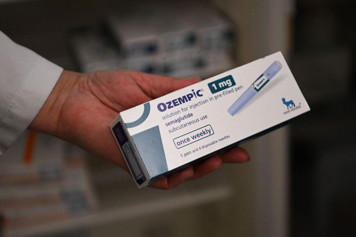 A pharmacy owner shows an Ozempic antidiabetic medicine at a pharmacy A pharmacy owner shows an Ozempic antidiabetic medicine at a pharmacy