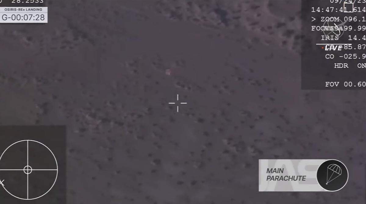 This image taken from video provided by NASA TV shows the capsule released by the Osiris-Rex spacecraft parachuting down to Earth on September 24 2023. Photo: NASA TV via AP