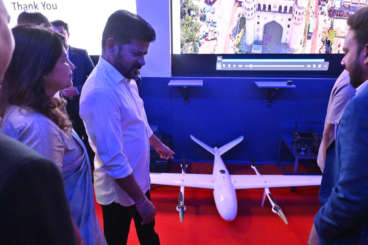 Telangana Chief Minister A. Revanth Reddy, DGP (Cyber Security Bureau) Shikha Goel visiting stalls at the cyber security conclave SHIELD 2025 held in Hyderabad on Tuesday (February 18, 2025)