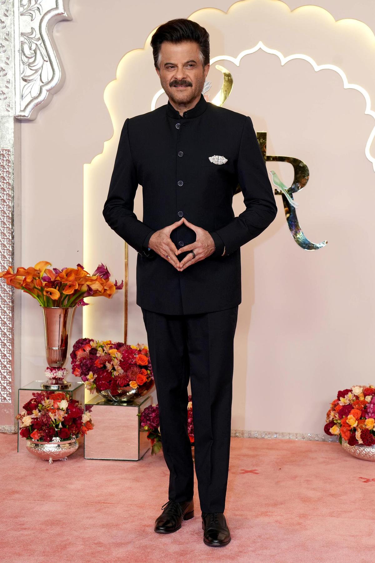 Mumbai, Jul 12 (ANI): Actor Anil Kapoor poses for a photo on his arrival for Reliance Industries Chairman Mukesh Ambani’s son Anant Ambani and Radhika Merchant’s wedding, at the Jio World Convention Centre, in Mumbai on Friday Mumbai, Jul 12 (ANI): Actor Anil Kapoor poses for a photo on his arrival for Reliance Industries Chairman Mukesh Ambani’s son Anant Ambani and Radhika Merchant’s wedding, at the Jio World Convention Centre, in Mumbai on Friday