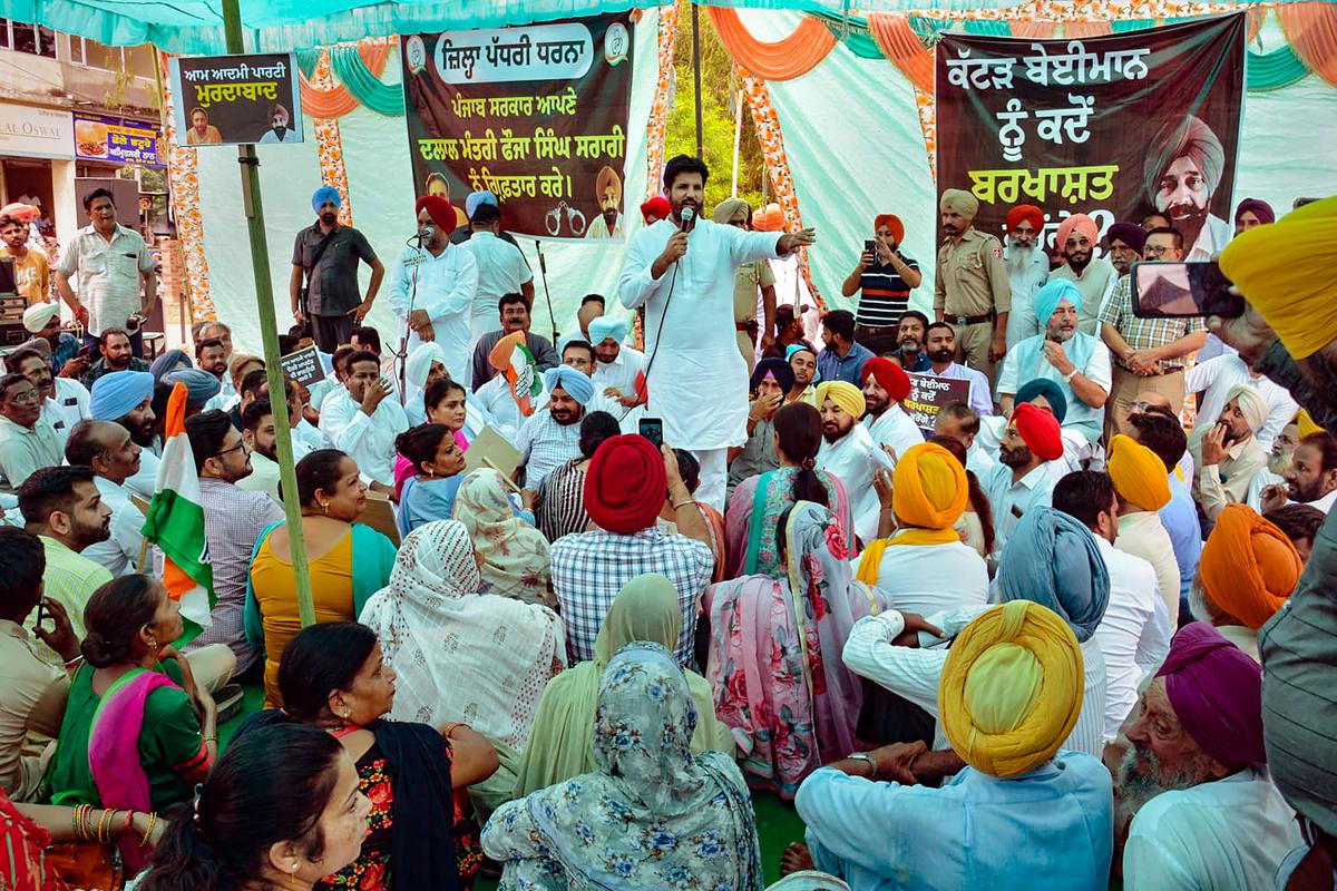 Punjab Congress president Amarinder Singh Raja Warring addresses party workers during a protest against the State government, in Patiala, on Oct. 10, 2022.
