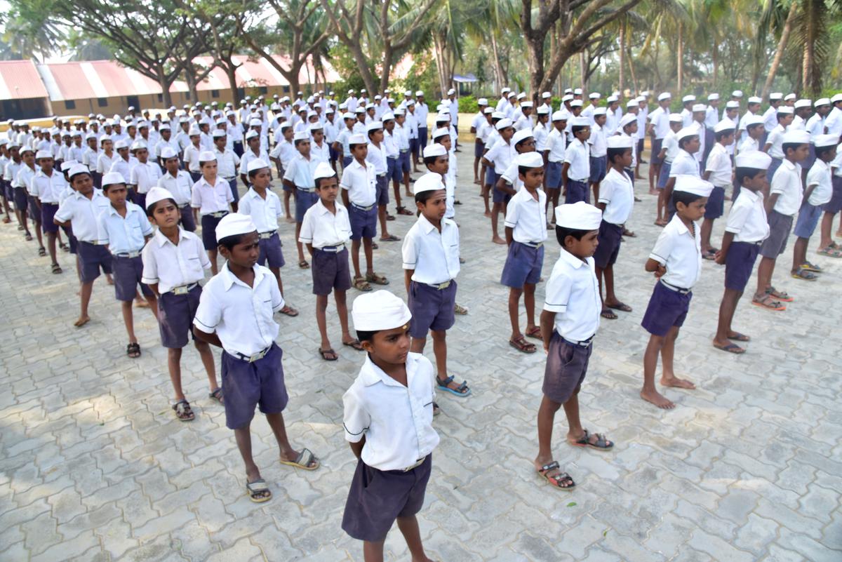 Students of Gandhi Grameen Gurukul Residential School at Hosaritti in Haveri district of Karnataka at the daily school assembly.