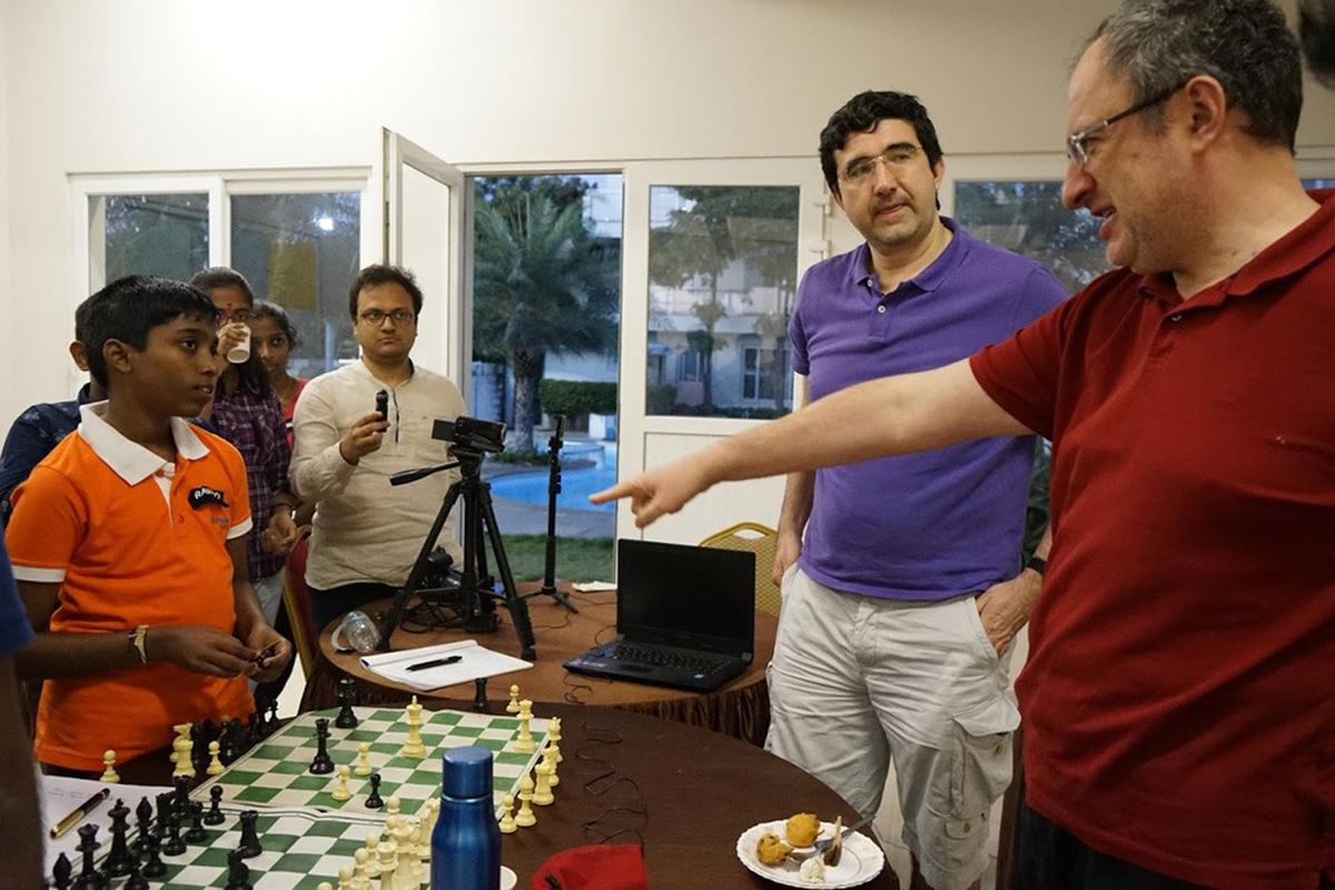 Mentoring prodigies: Gelfand, seen here with former World champion Vladimir Kramnik and R. Praggnanandhaa, spends a lot of time coaching young talent. | Photo credit: Special Arrangement