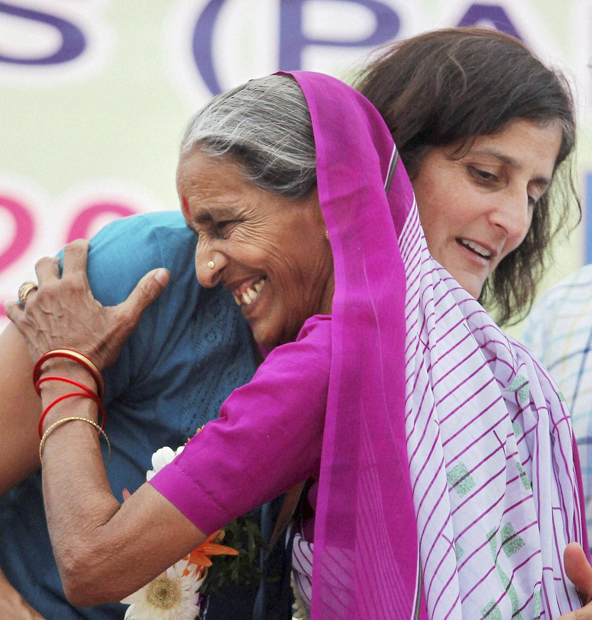 American Astronaut of Indian origin, Sunita Williams, hugs a woman during her visit to her ancestral village Jhulasan in Mehsana district of Gujarat on Thursday.   