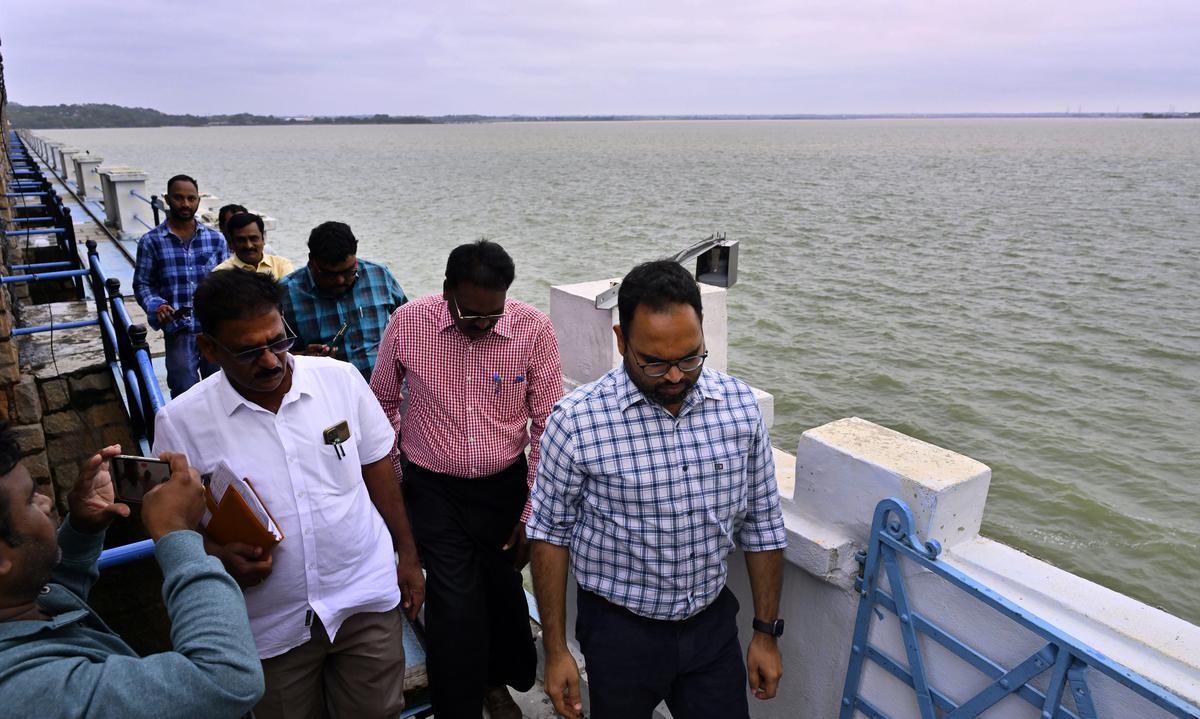 Rangareddy district collector and magistrate, K. Shashanka and others officials inspects historical Himayatsagar reservoir in Hyderabad on Monday (September 02, 2024), following heavy rains in the last few days in the city.