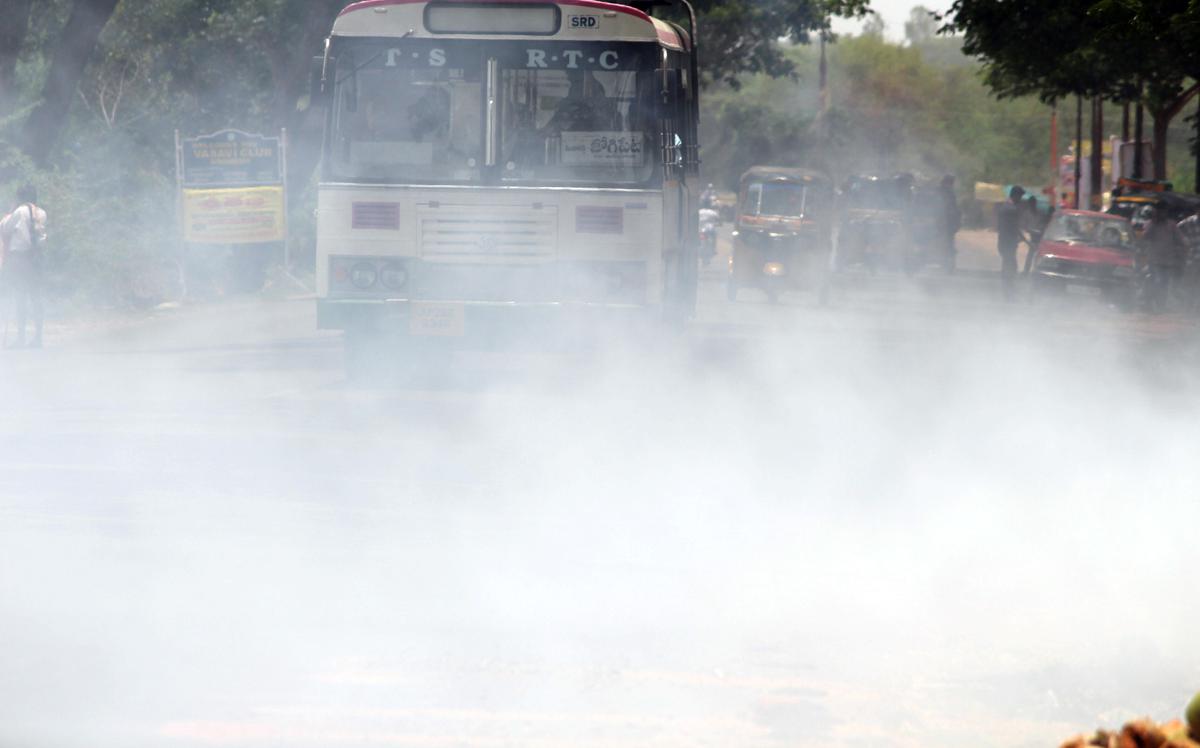 File photo of garbage burning in Sangareddy on the main road disrupting the traffic and general public.