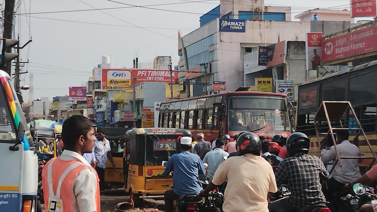 A junction choked by share autos