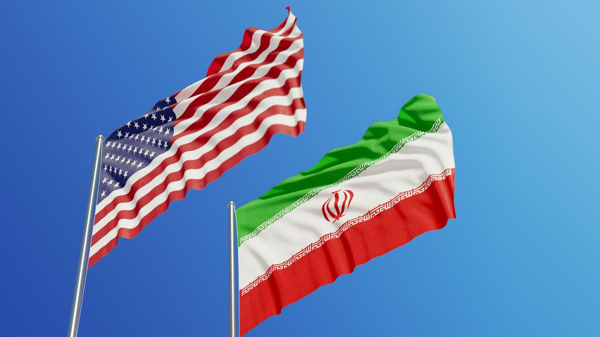https://th-i.thgim.com/public/incoming/qx0t4e/article69685975.ece/alternates/LANDSCAPE_1200/Iran-USflags.jpg