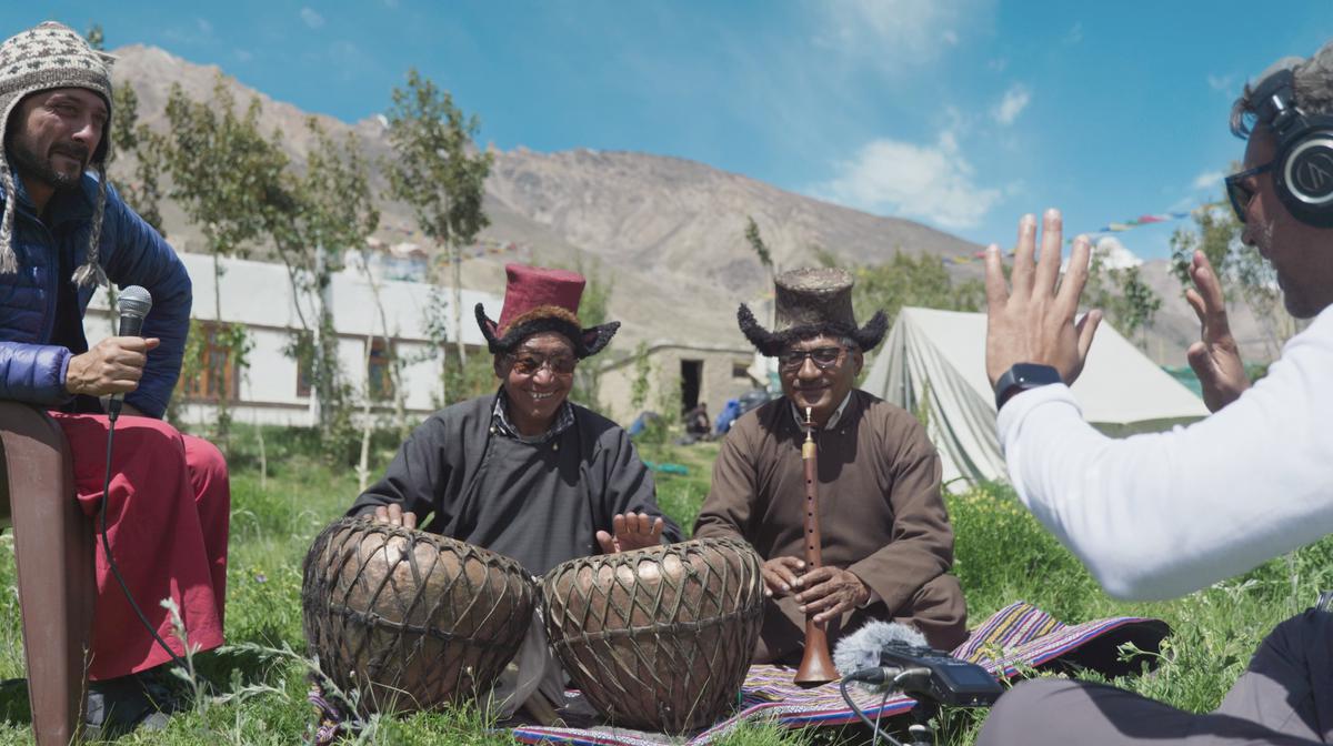 Artistes playing the Surna and the tabla-like percussion instrument 