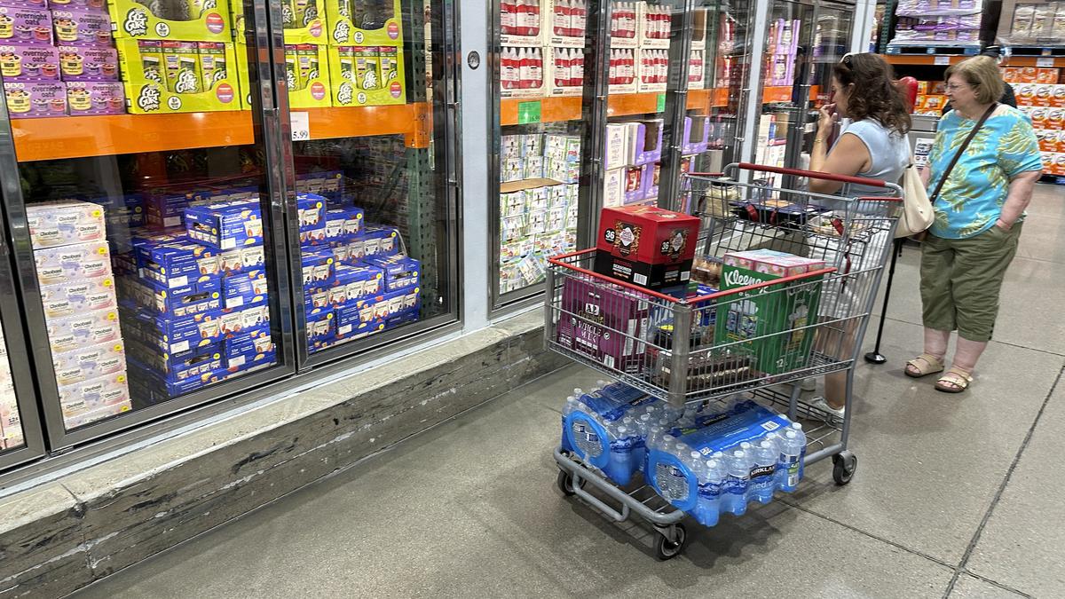 U.S. consumer spending picks up; inflation rises moderately in July