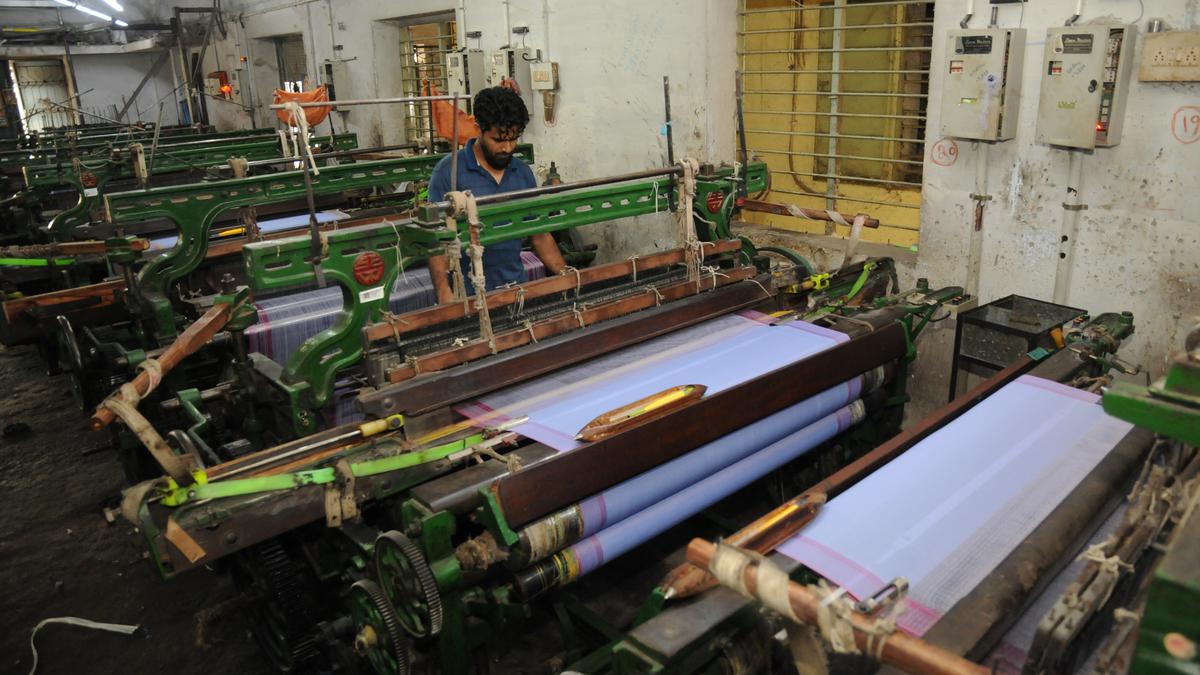 T.N. Power looms Federation seeks hike in wages for producing free dhotis and saris