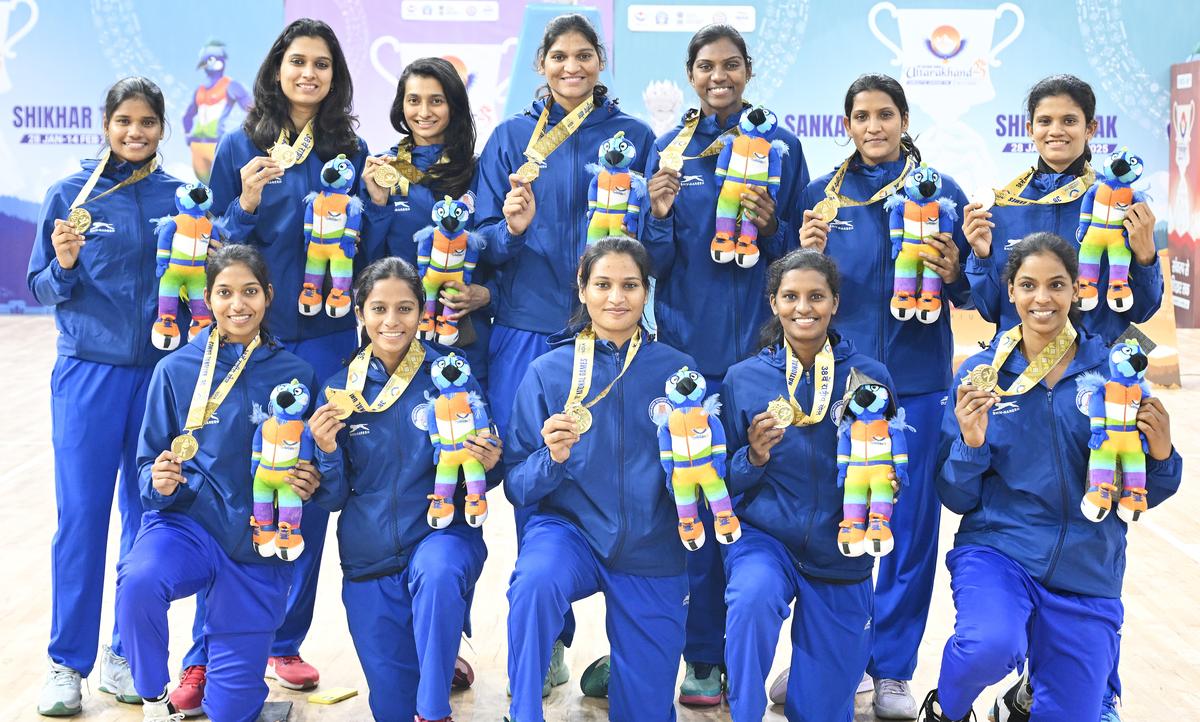 All smiles: The Tamil Nadu women’s basketballers with their gold medals.