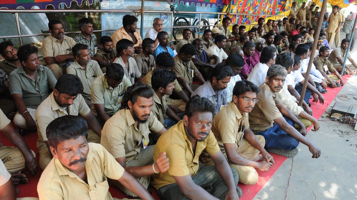 Conservancy workers observe fast opposing privatisation of solid waste management activities in Erode