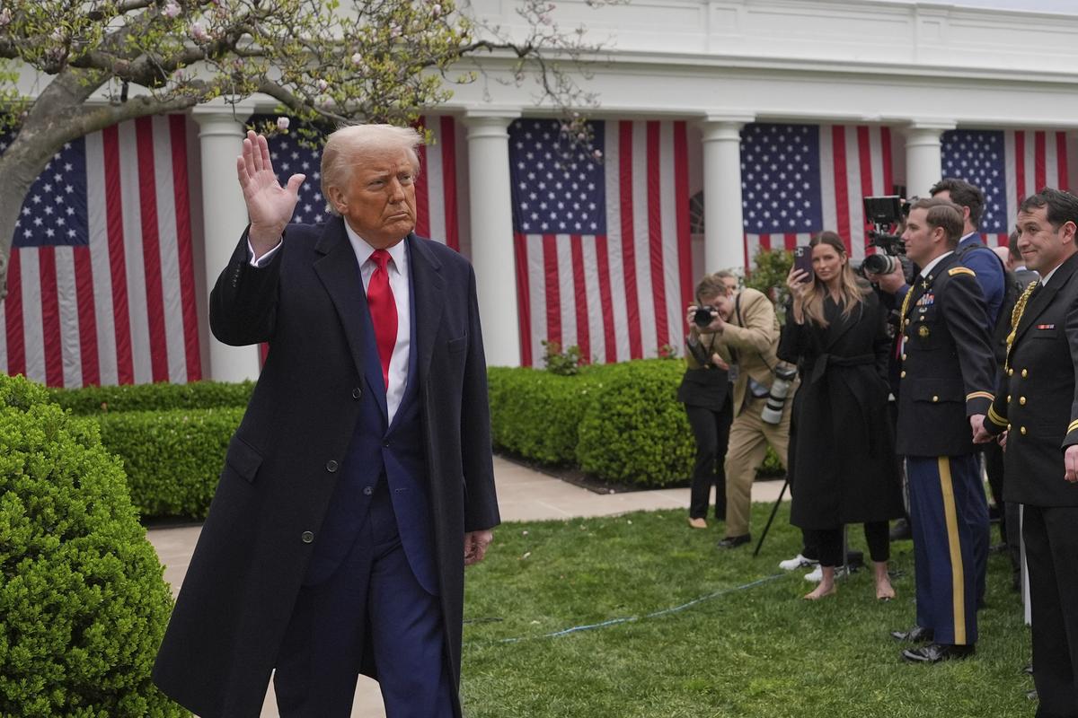 President Donald Trump departs after signing an executive order at an event to announce new tariffs in the Rose Garden of the White House on April 2, 2025. 