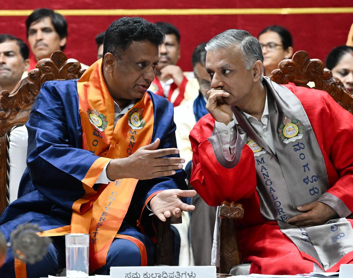 M.C. Sudhakar, Minister for Higher Education, and Prof. Sachin Chaturvedi, Director General of Research and Information System for Developing Countries of New Delhi at the convocation ceremony of Mangalore University.