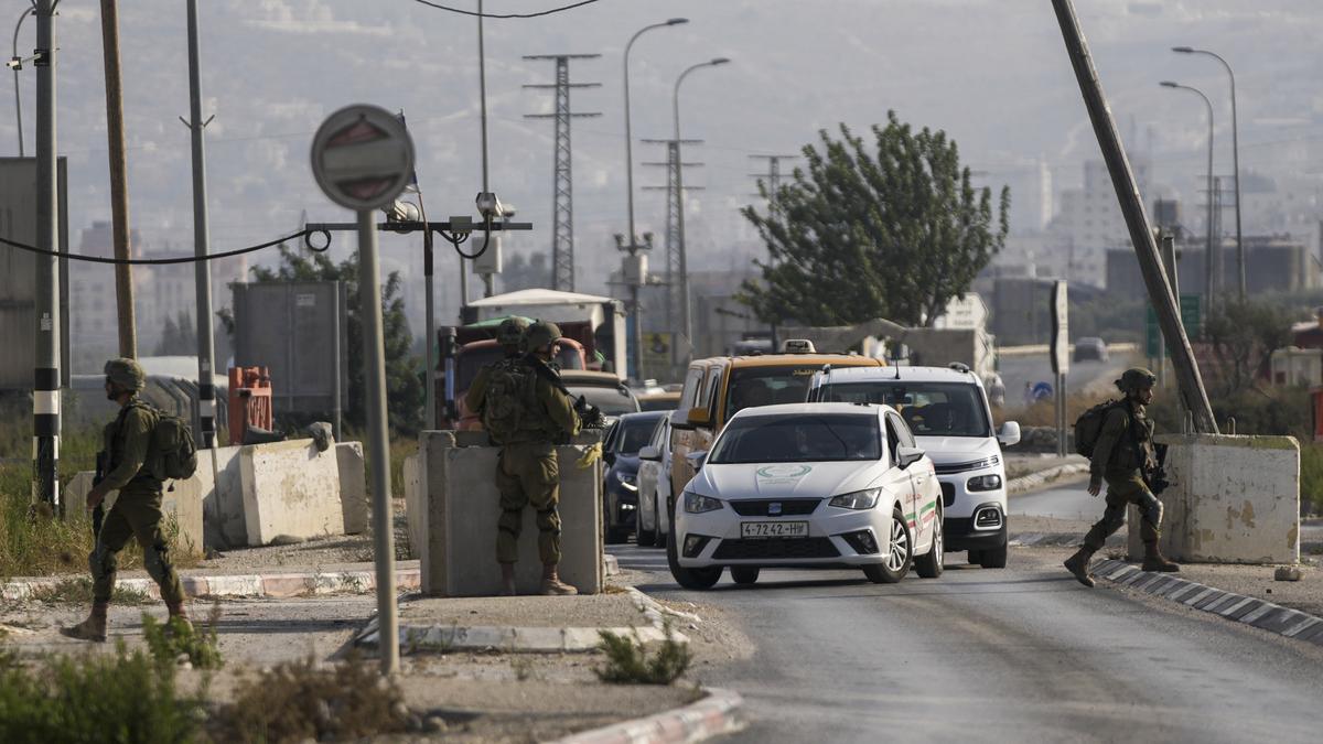 Suspected Palestinian shooting attack at West Bank car wash kills 2 Israelis