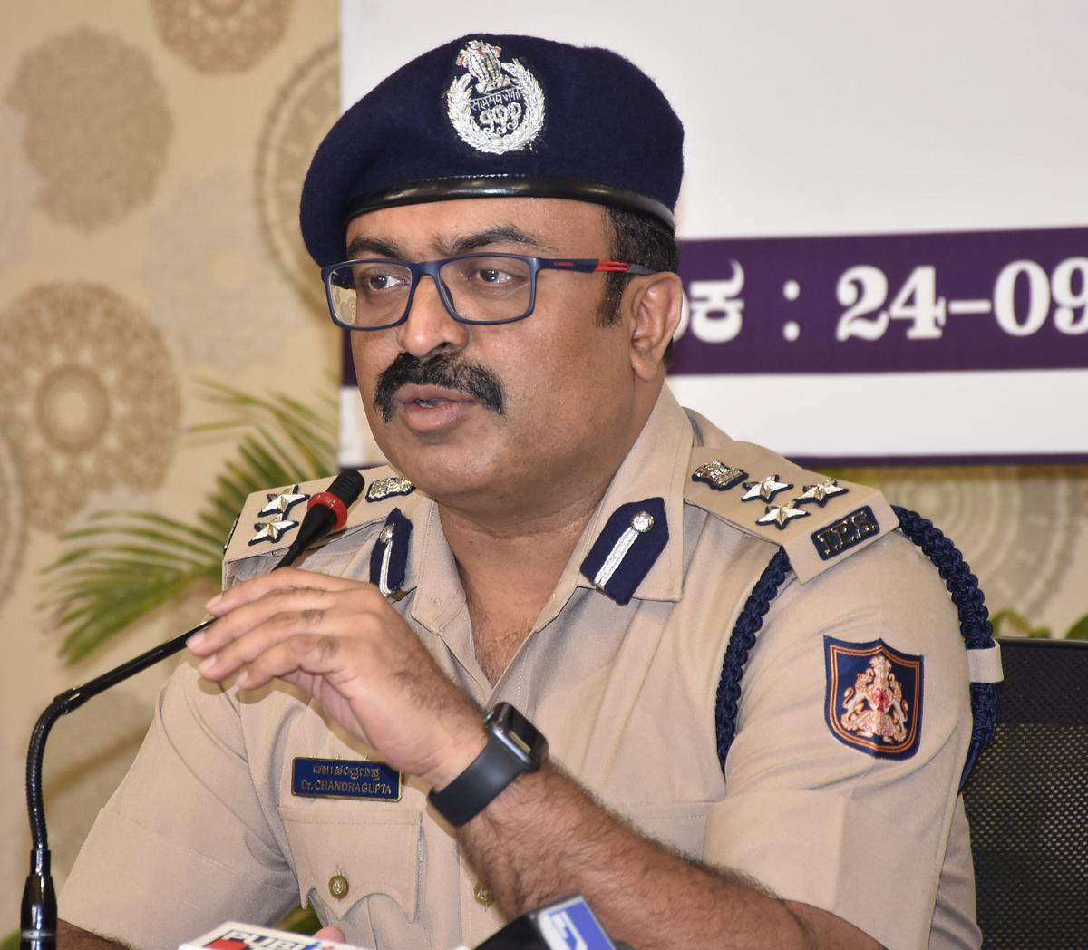 City Police Commissioner Chandragupta discusses a program. 