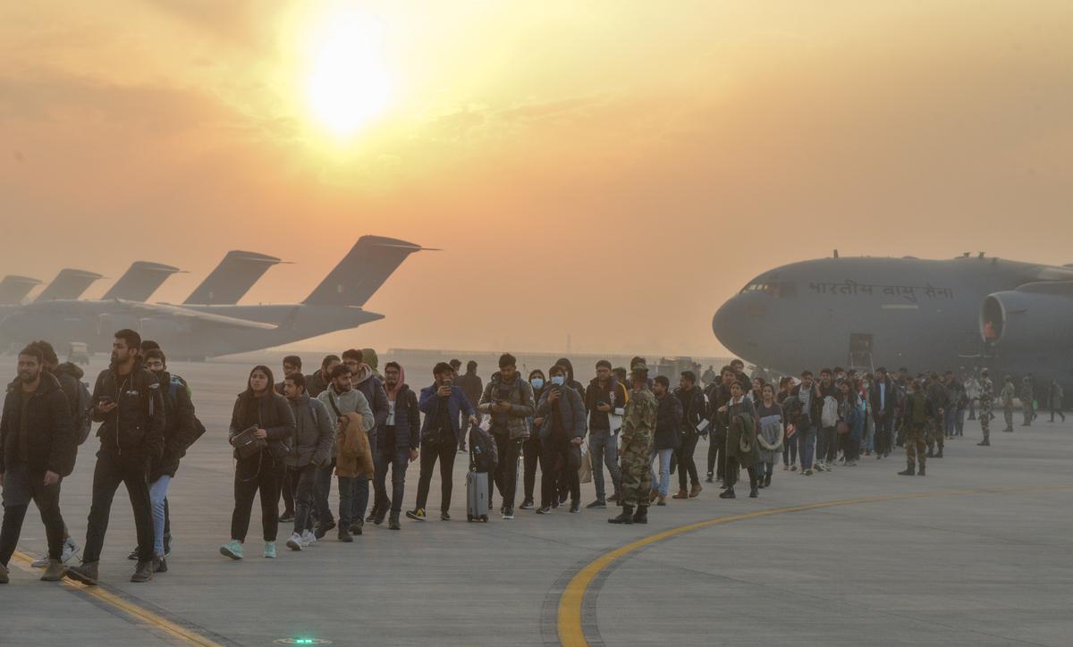 Students arrive at Hindon Airbase in Uttar Pradesh after being evacuated from Ukraine by the Indian government. 