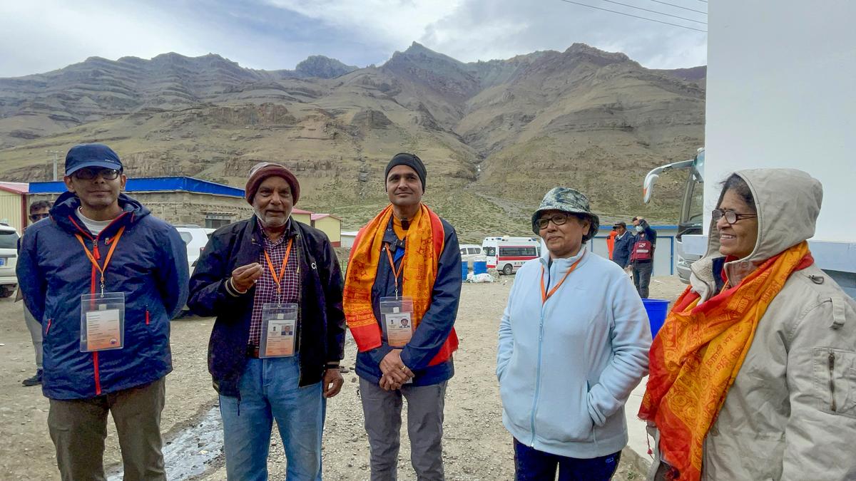 Pilgrims pose after completing the parikrama of Mount Kailash. Pilgrims pose after completing the parikrama of Mount Kailash.