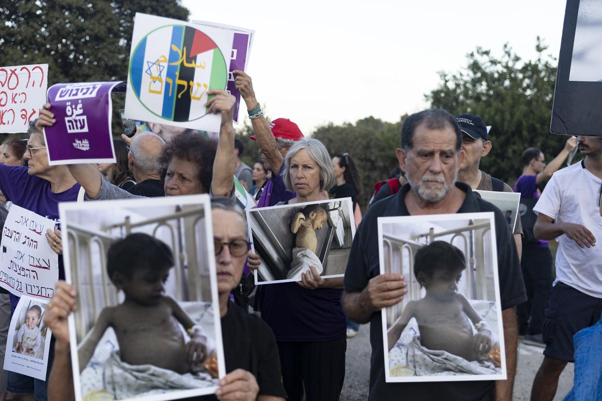 Israeli activists take part in a protest against the war in the Gaza Strip, on August 6, 2025 in Yad Mordechay, Israel. 