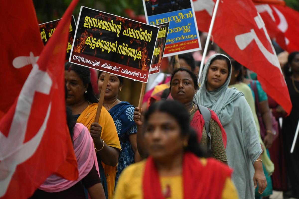 CPI(M) workers arrive for the Palestine solidarity meet organised by the Ernakulam district committee of the party in Kochi on Thursday. 