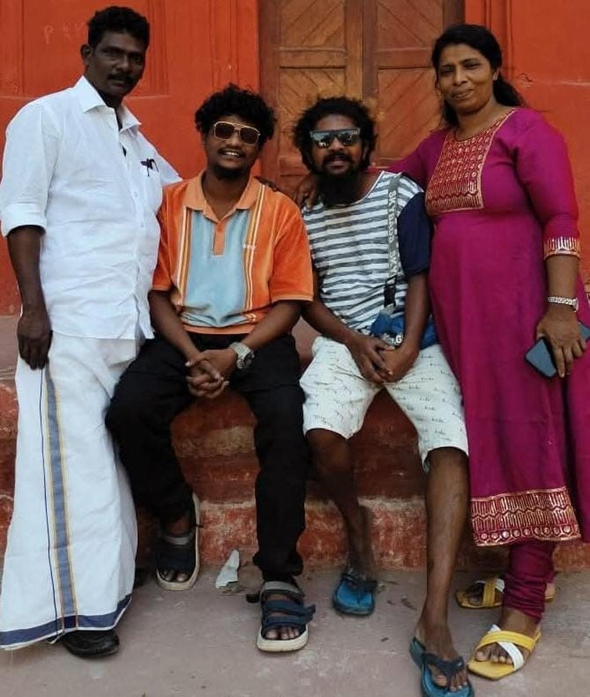 Satheesh and Dhanuja with their sons Sudheesh and Nidheesh.