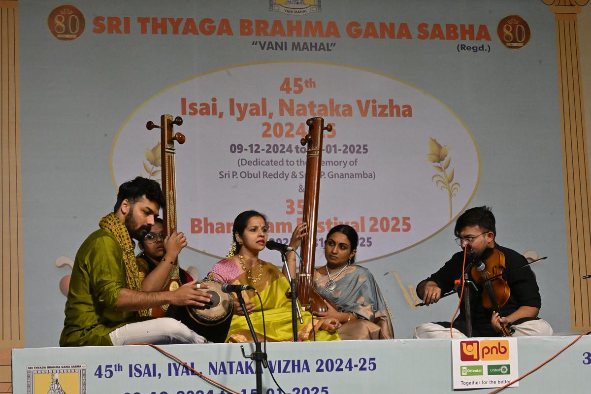 K with Sai Rakshit on violin. Sumesh Narayanan on Gayatri and Mridangam. 