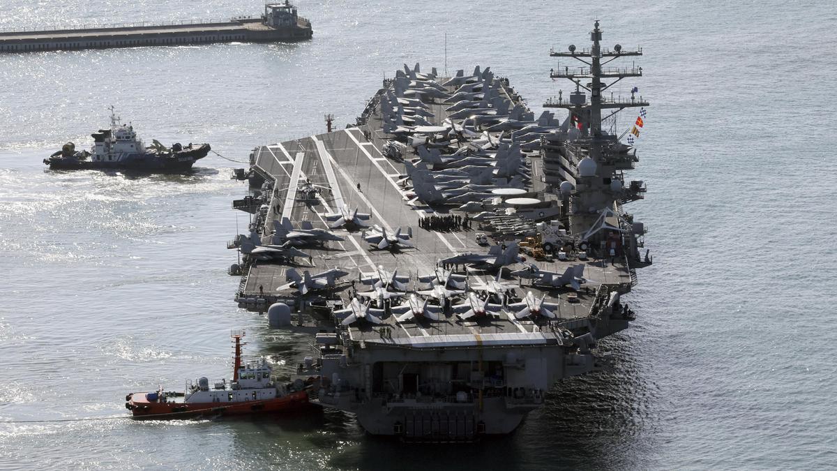 U.S. aircraft carrier arrives in South Korea as North's leader Kim exchanges messages with Putin