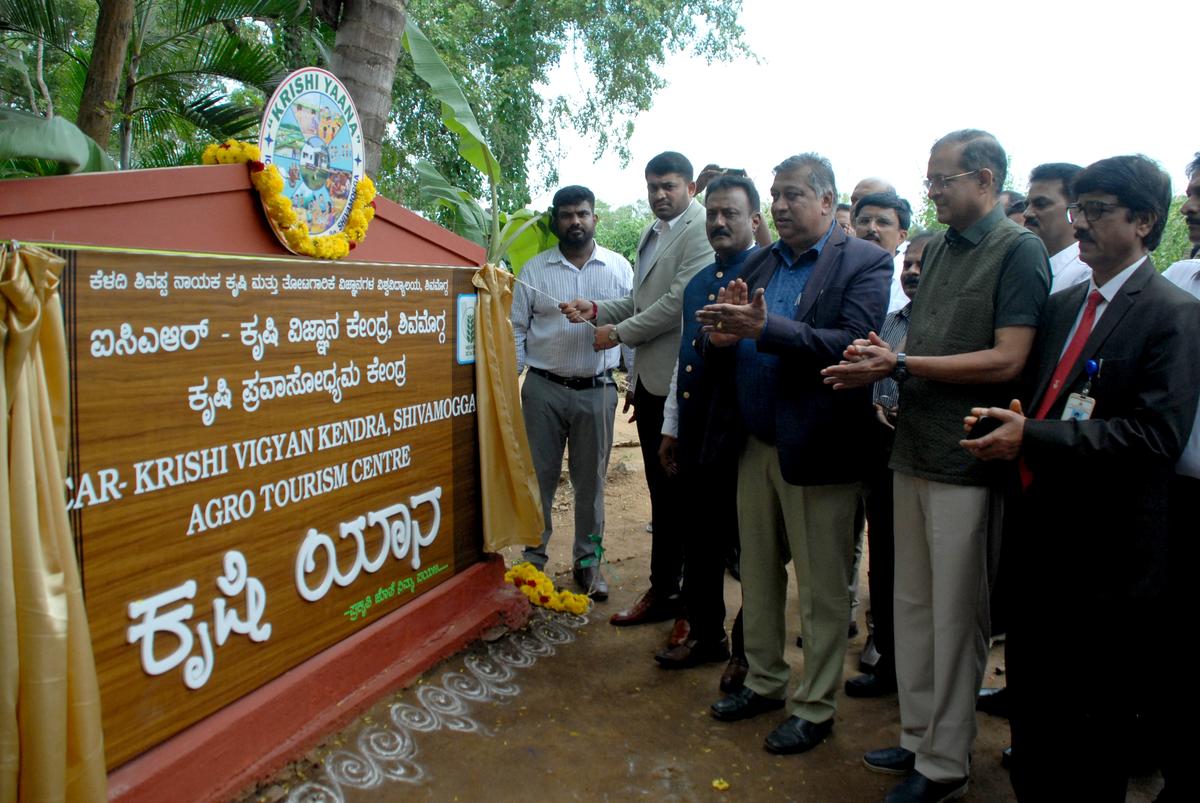 Dignitaries inaugurating ‘Krishi Yaana’, an agro-tourism initiative, on the ICAR-KVK campus at Navile village near Shivamogga on Thursday.