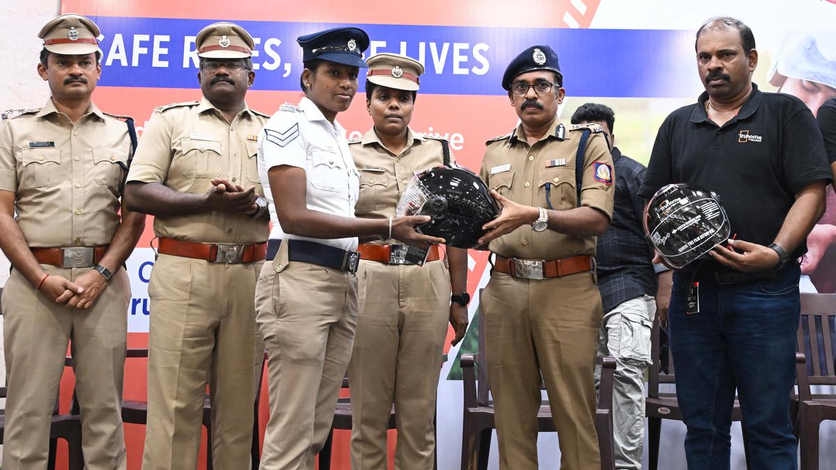 Helmets distributed to police personnel, Home Guards as part of road safety awareness drive