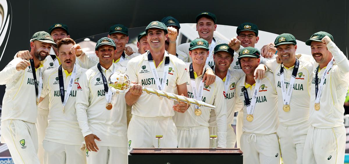Australia captain Pat Cummins celebrates with teammates after winning the ICC World Test Championship Final 2023 against India, at The Oval, in London