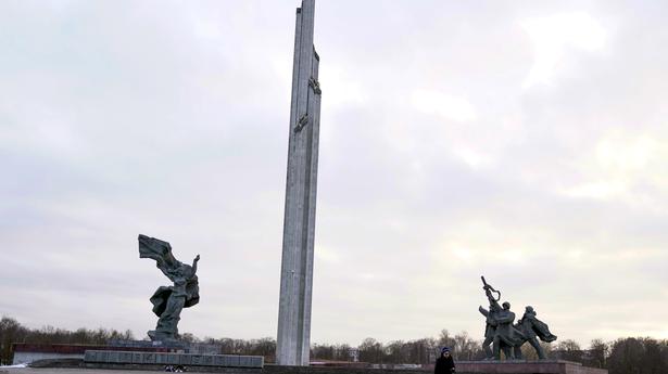 Soviet-era monument's iconic obelisk pulled down in Latvia in response to Ukraine invasion