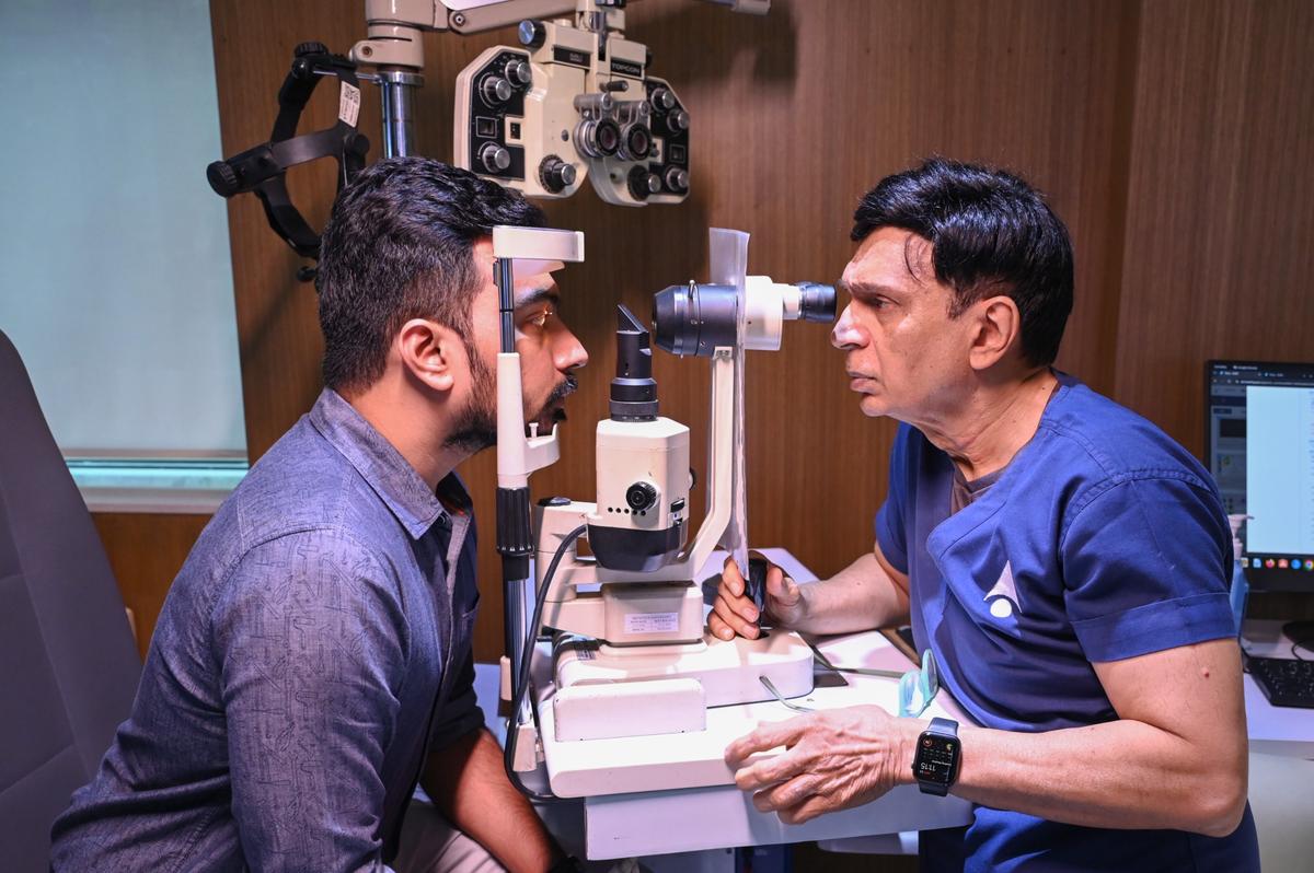 Dr. Amar Agarwal examining a patient in his hospital Dr. Amar Agarwal examining a patient in his hospital