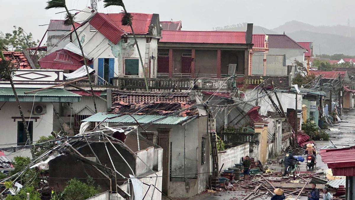 Typhoon Bualoi becomes a tropical storm that rips through Vietnam, killing at least 9 people